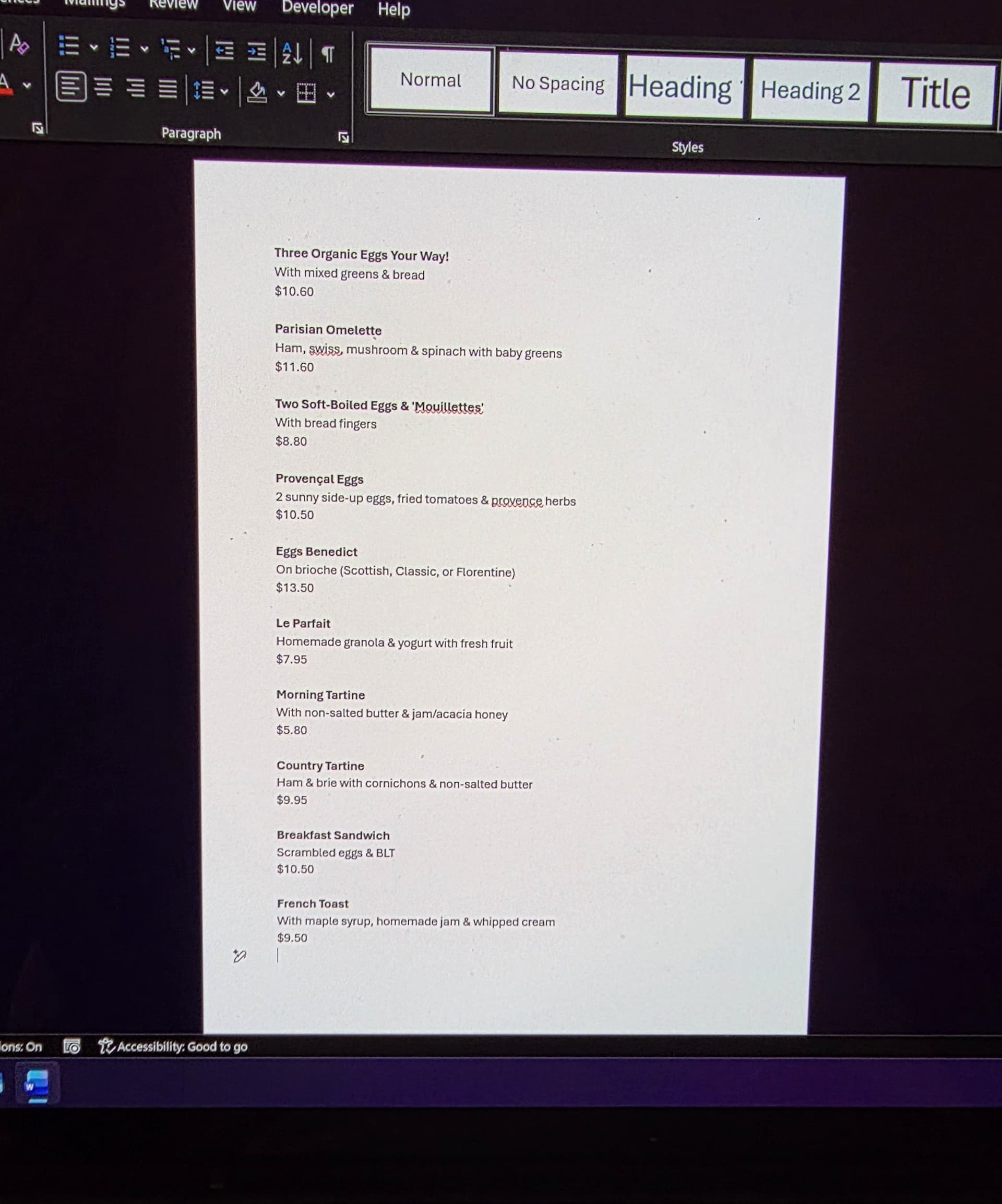 A photo of a printed breakfast menu — the kind you can photograph and upload to GridMenu for automatic extraction